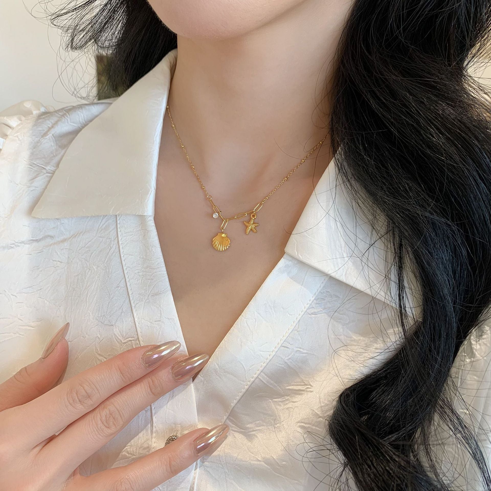 Golden Starfish & Shell Titanium Steel Necklace – Ocean-Inspired Elegance