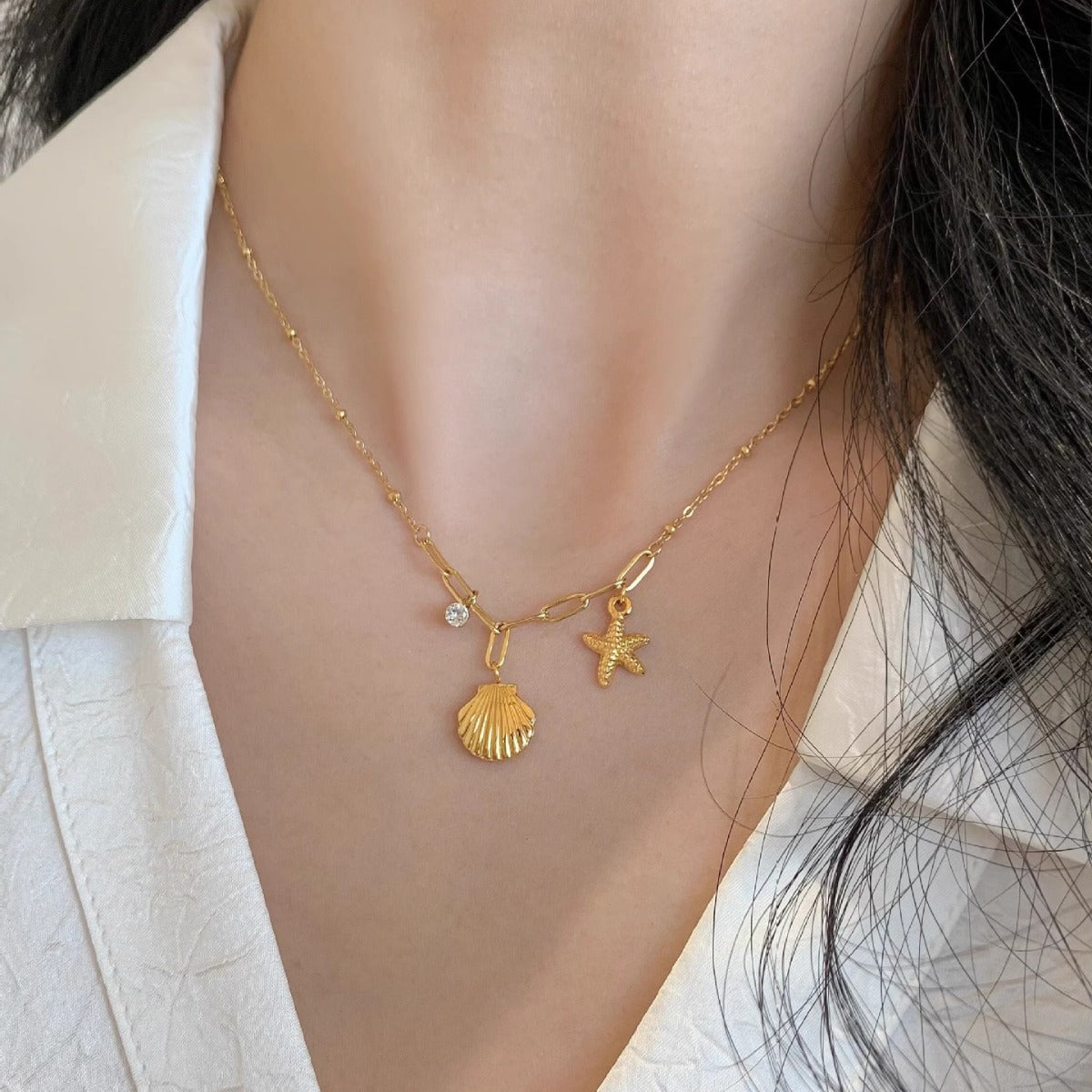 Golden Starfish & Shell Titanium Steel Necklace – Ocean-Inspired Elegance