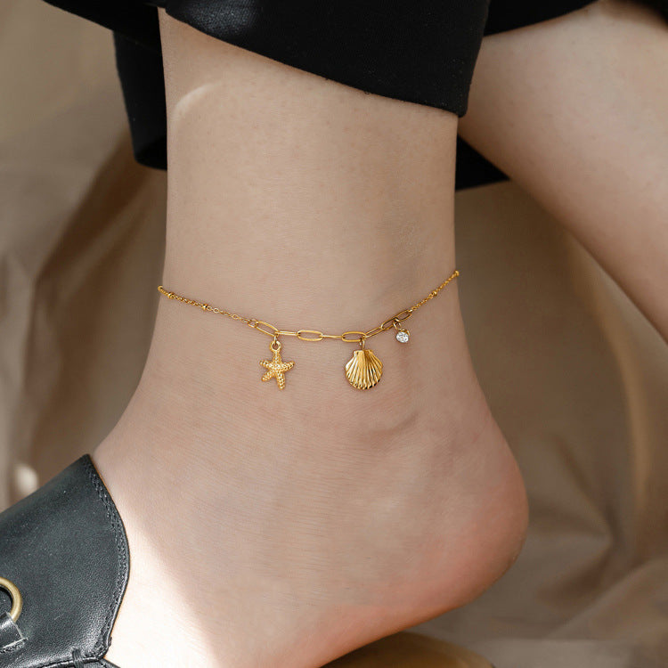 Golden Starfish & Shell Titanium Steel Necklace – Ocean-Inspired Elegance